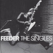 the album cover for Feeder - Singles [Clear Vinyl] (Pnk)