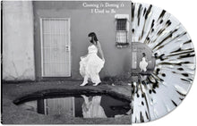 the album cover for Crossing I's Dotting T's - I Used To Be [BLACK/WHITE/CLEAR SPLATTER]