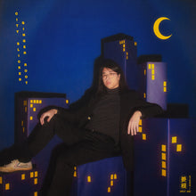 the album cover for Ginger Root - City Slicker (5th Anniversary Edition) (Blue)