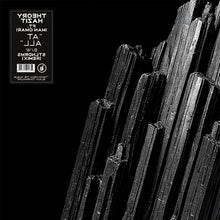 the album cover for Theory Hazit - At All ft. Iman Omari b/w At All (STLNDRMS Remix)